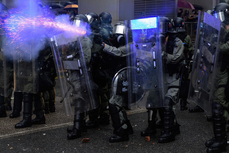 Image: Police fire tear gas during a protest in Tsuen Wan district of Hong Kong