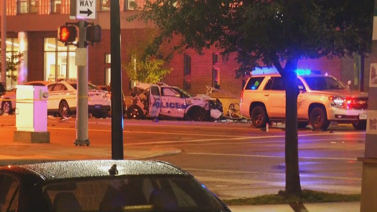 Image: Emergency services respond to the scene of a crash involving a stolen police car in Dayton, Ohio.