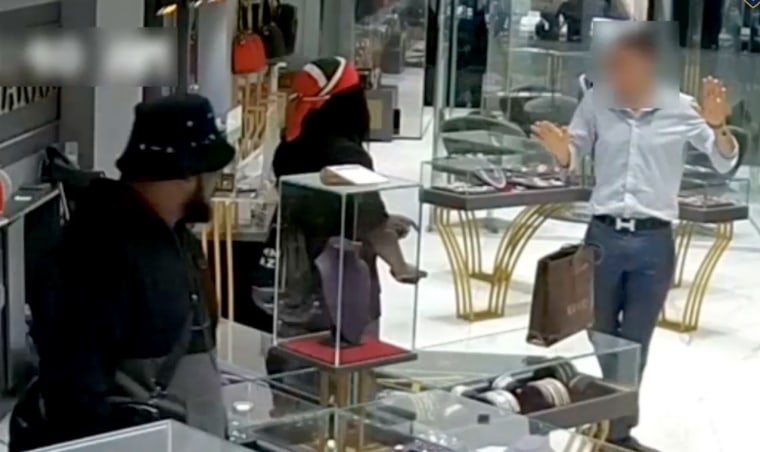 Image: The video shows the thieves holding up a high-end store in New York City's Diamond District as they tied up employees at gunpoint.