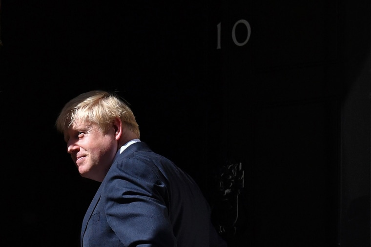 Image: Britain's new Prime Minister Boris Johnson turns to enter no 10 after giving a speech outside 10 Downing Street in London