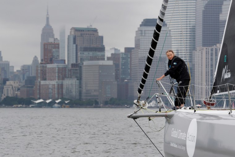 Image: Swedish activist Greta Thunberg sails past the Statue of Liberty on the Malizia II racing yacht in New York Harbor