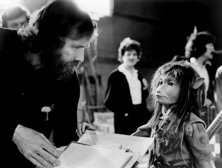 THE DARK CRYSTAL, producer, director, screenwriter Jim Henson, on-set, with 'Kira,' 1982, (C)Universal
