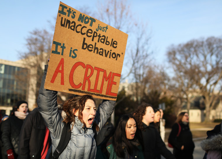 Image: A demonstration supporting rape survivors at Northwestern University in Evanston, Ill.