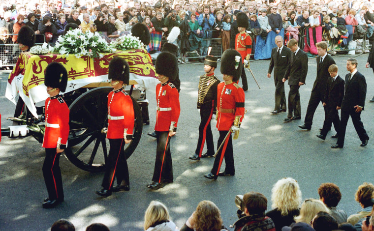 Image: Guardsmen escort the coffin of Diana, Princess of Wales draped in the Royal Standard, as the cortege passes through crowds gathered along Whitehall