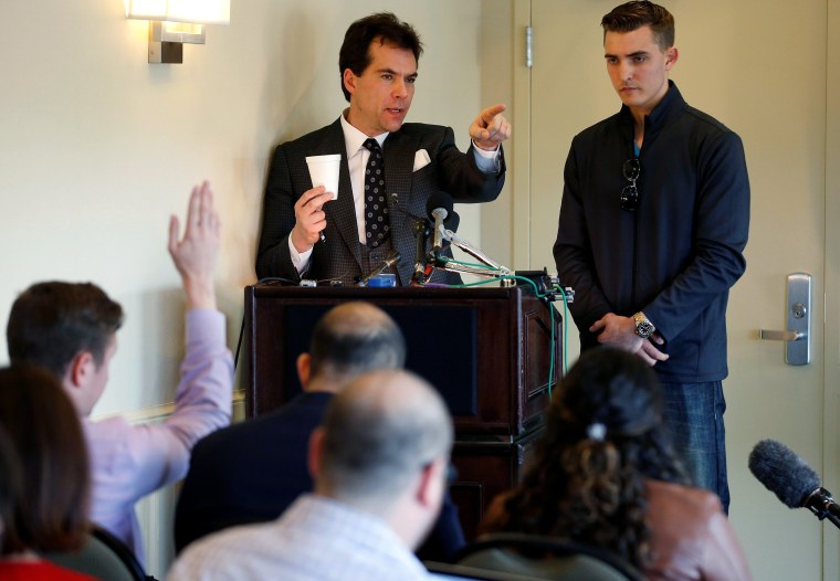 Attorney and Republican operative Jack Burkman and internet activist Jacob Wohl speak during a news conference on their allegations against Special Counsel Robert Mueller in Arlington, Virginia