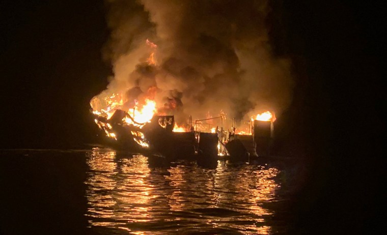 Image: A 75-foot (23-meter) vessel burns during a rescue operation off Santa Cruz Island