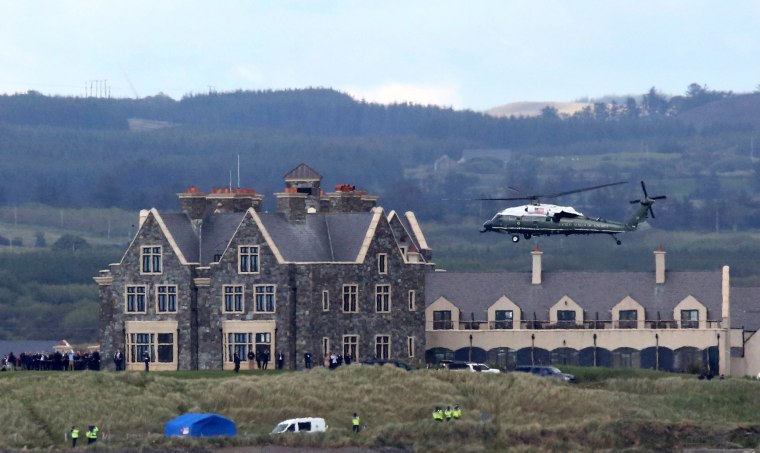 Image: Marine One, carrying President Donald Trump and first lady Melania Trump comes in to land at the Trump International Golf resort near the village of Doonbeg in Ireland