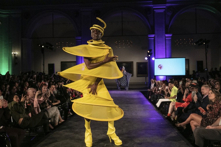 Image: A model presents a creation from The Claire Fleury collection during the dapperQ fashion show