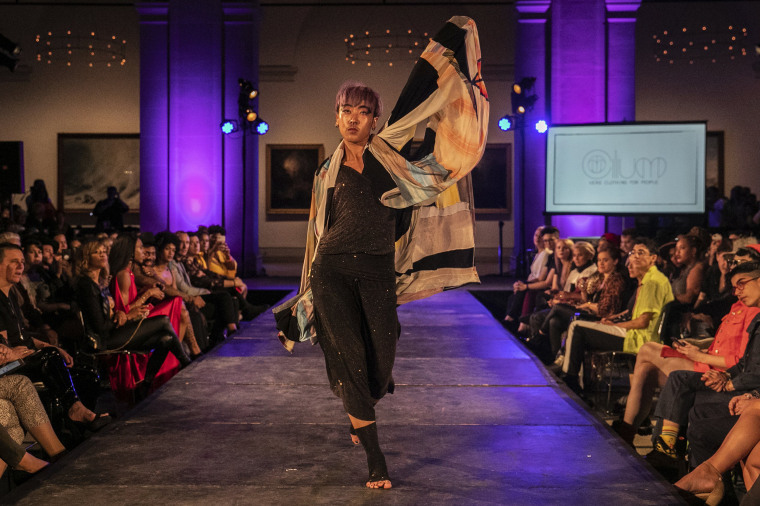 Image: A model presents a creation from The Cilium collection during the dapperQ fashion show