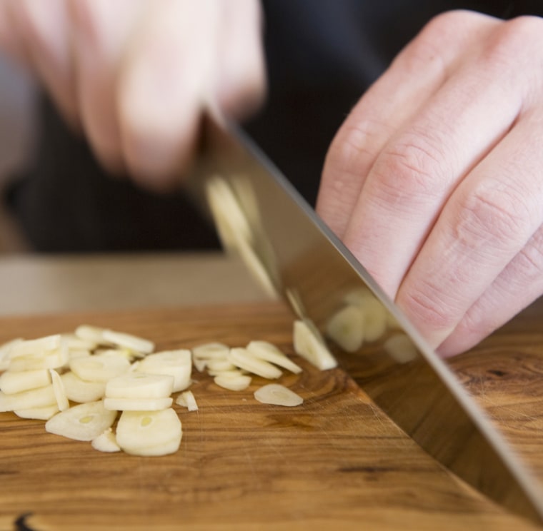 Slicing garlic? Make sure to keep the clove steady while using a sharp knife. 