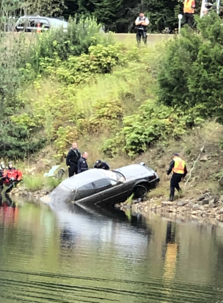 The car being removed from the lake after being submerged for more than a quarter of a century.