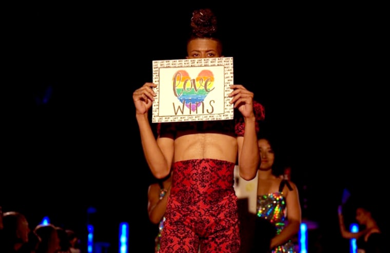 Image: Chris Zenn, a model, walks in the Melange Movement fashion show in Harlem on Sept. 6, 2019.