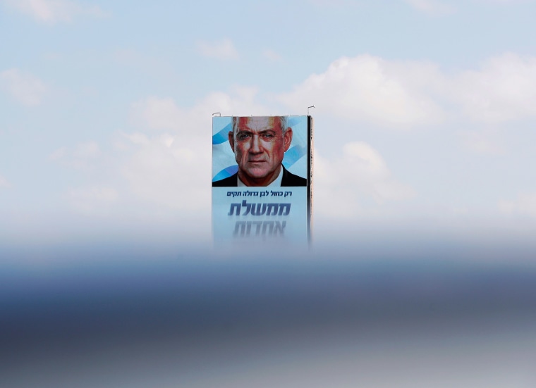 Image: Benny Gantz, leader of Blue and White party is depicted in an election campaign banner in Tel Aviv, Israel