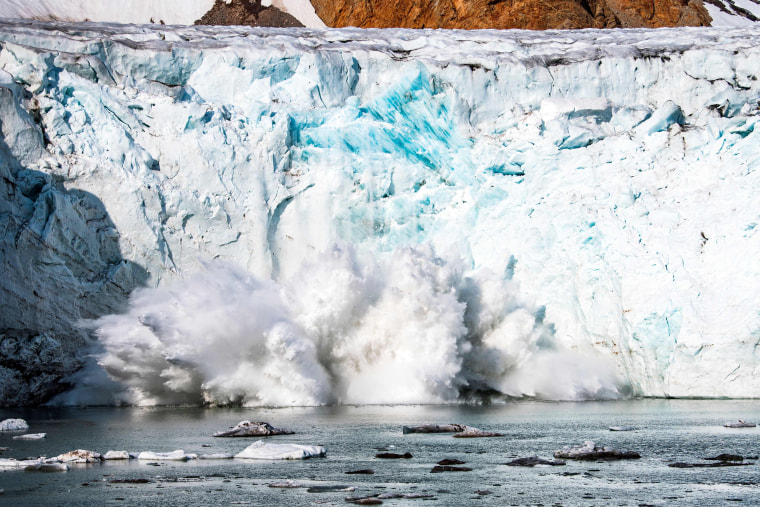 Image: GREENLAND-DENMARK-NATURE-ENVIRONMENT-CLIMATE-GLACIER-CALVING