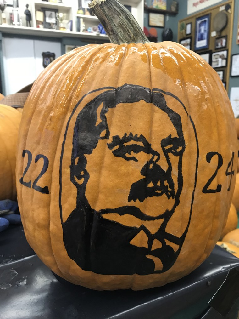 Grover Cleveland drawn on a pumpkin, but not yet carved