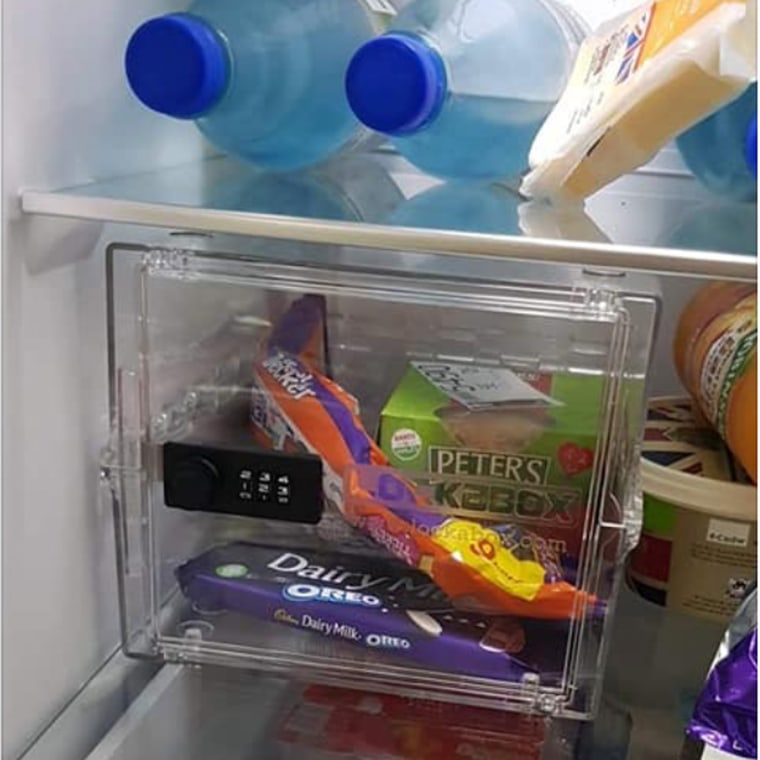 LAIRY MILK! FURIOUS CHOCOLATE ADDICT RETURNS HOME TO FIND HUBBY-TO-BE HAS INSTALLED FRIDGE SAFE TO STOP HER FROM STEALING HIS TREATS