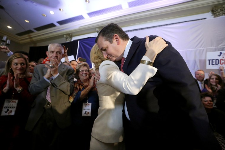 Image: Republican U.S. Senator Cruz embraced by wife Heidi at his midterm election night party in Houston