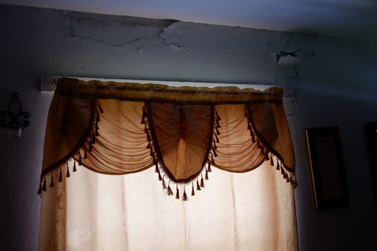 Peeling paint inside of Gertha Saint Juste's home at the Okeechobee Center