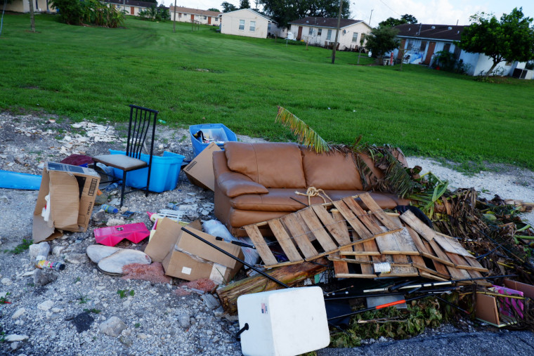 A pile of trash alongside the road inside the Okeechobee Center