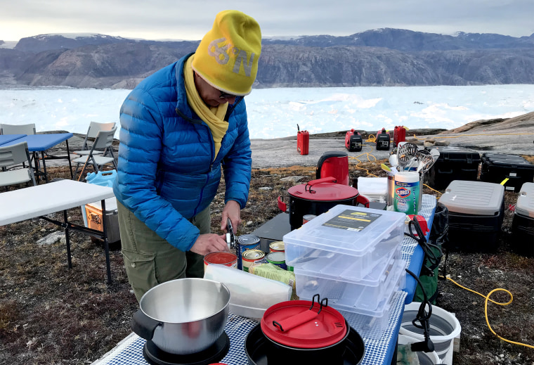 A scientist, a logistics coordinator, a mountaineering guide and me, an NBC News reporter were stuck on Helheim Glacier in Greenland overnight without being fully prepared.