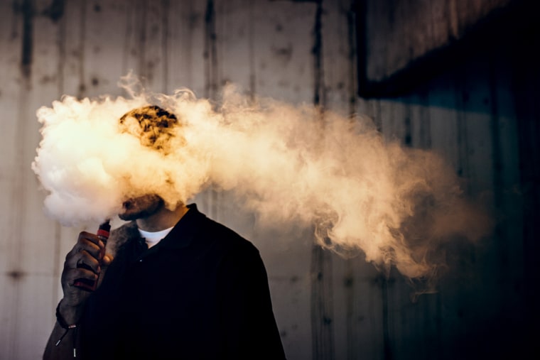 Image: Man Using An Electric Cigarette and or Vape