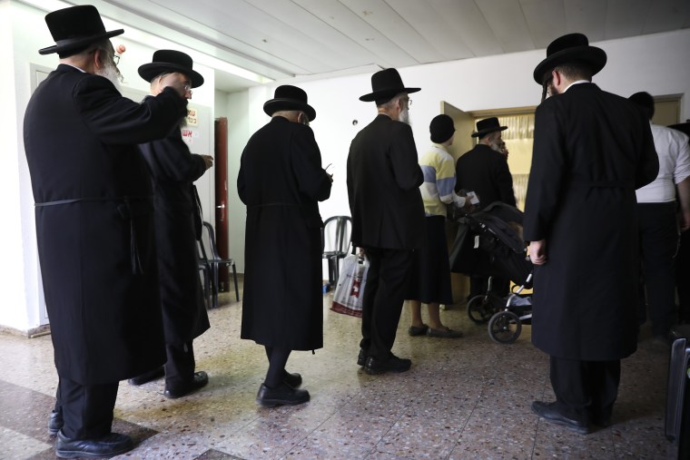 Image: Ultra orthodox Jews line up to vote in Bnei Brak, Israel