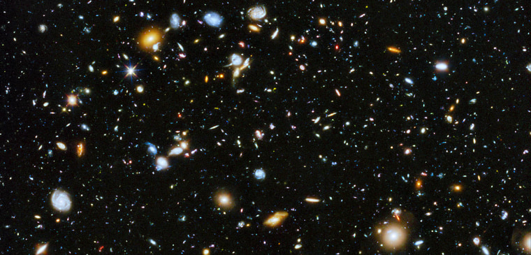 Image: A view of the distant universe produced by the Hubble Space Telescope, combining observations of the field from 2002 to 2012.