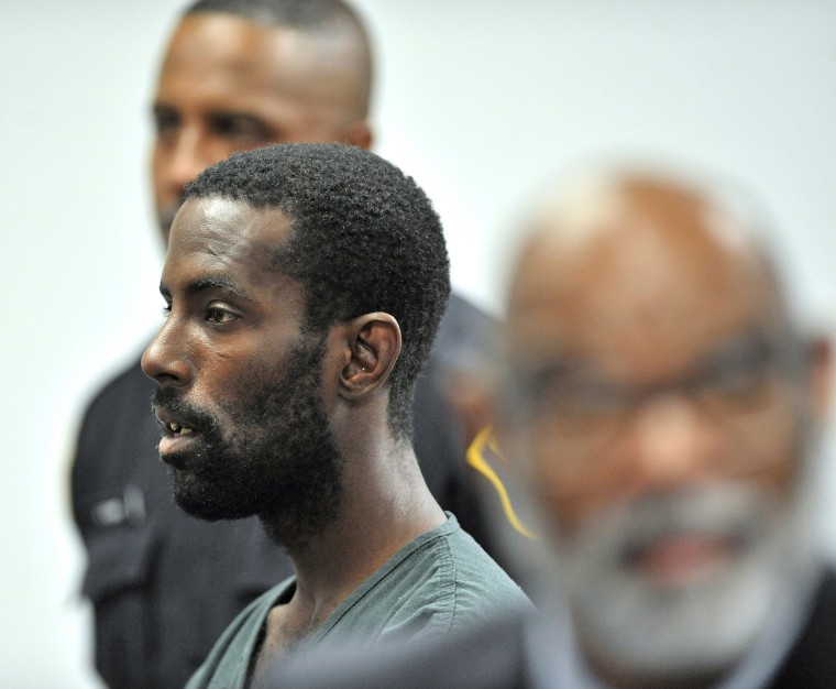 Image: Deangelo Martin stands for a probable cause hearing
