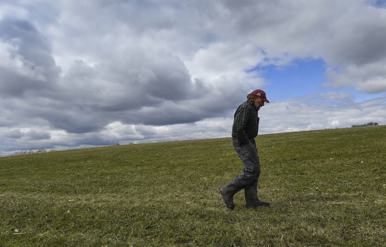 MONTGOMERY, MN - APRIL 18: Bob Krocak walks to check on his pro