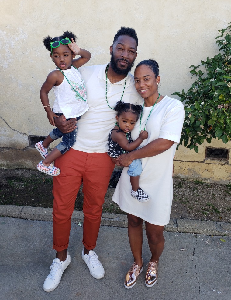 Muhammed Nitoto with his partner, Hejira Thompson, and their daughters, Zendaya, 2, and Zuri, 1.