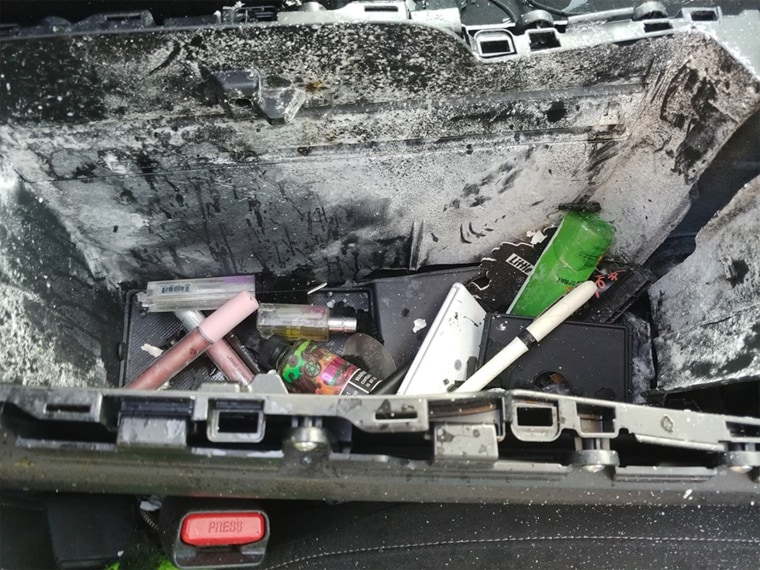 The explosion blew the lid of the center console off its hinges.