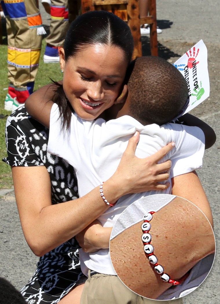 The bracelet was visible as the duchess hugged a young well-wisher.