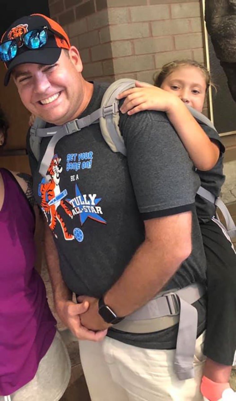 Jim Freeman volunteered to carry Ryan Neighbors for the duration of the field trip. 