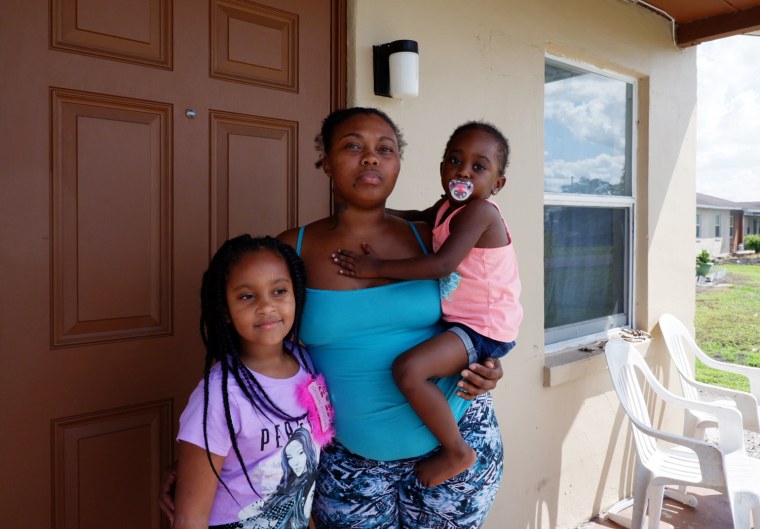 Monique Mottley, 30, with her 3-year-old daughter and 7-year old niece. Mottley lives at the Okeechobee Center with her grandmother, a retired farmworker, in Belle Glade, Florida.