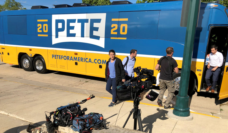 Pete Buttigieg steps off on his campaign bus during a four day tour of Iowa on Sept. 23, 2019.