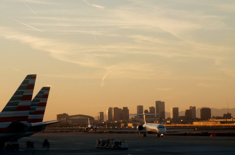 An American Airlines plane taxis at Phoenix Sky Harbor International Airport.