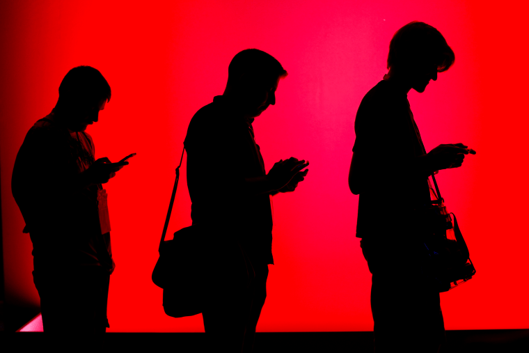 Image: People using phones