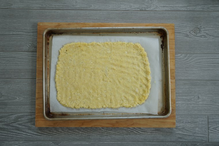 This versatile pizza crust base can be shaped into a circle or a square.