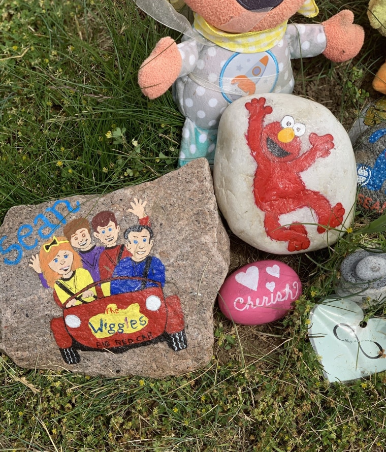 Members of the South County Rocks Rhode Island rock painting group created these rocks after Sean's passing to mark his grave.