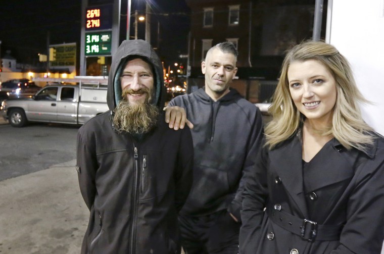 Johnny Bobbitt Jr., Kate McClure, and McClure's boyfriend Mark D'Amico at a Citgo station in Philadelphia on Nov. 17, 2017.