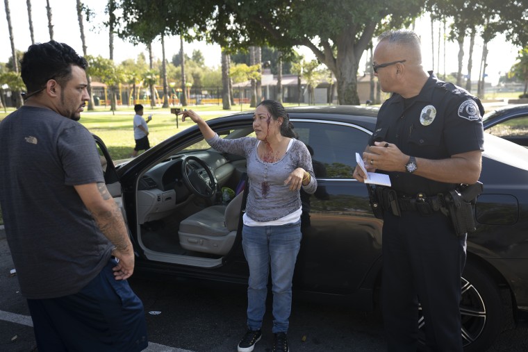 A woman was waiting to pick up a friend at Salt Lake Park when she was got into a physical altercation with people in the car next to her.