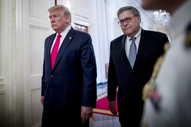 Image: President Donald Trump and Attorney General William Barr arrive at a ceremony in the East Room of the White House on Sept. 9, 2019.