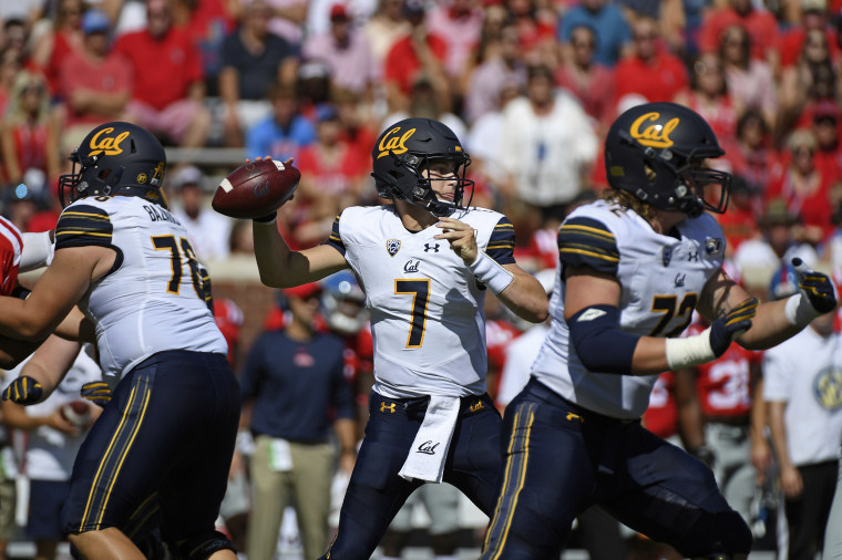 Image: California quarterback Chase Garbers throws the ball against Mississippi in Oxford, Miss., on Sept. 21, 2019.