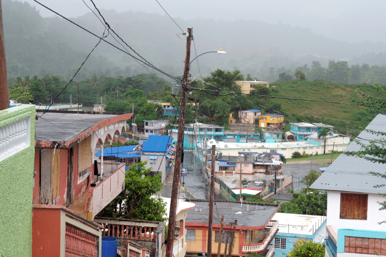 Image: Houses from a seaside neighborhood are seen as Tropical Storm Karen approaches in Naguabo