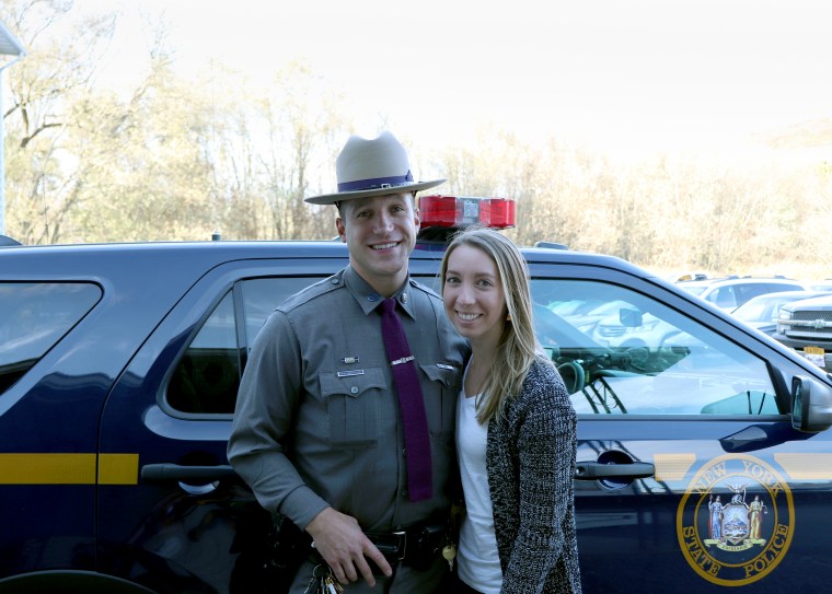 Frank Abbott, 29, poses in his New York State Police uniform with his wife, Michelle Abbott, 27. "I knew he was struggling and not getting the help he needed," Michelle Abbott said. "It was heartbreaking."