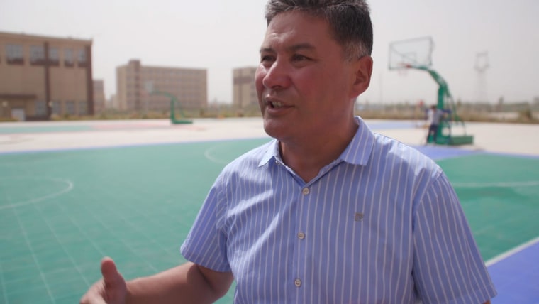 Image: Mijiti Maihemuti, the director of Kashgar's vocational education and training center, said conditions at his facility are "very good."