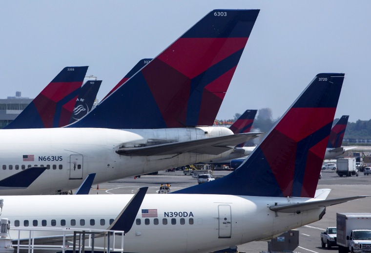 Image: Delta Airlines planes sit at Terminal 4 at John F. Kennedy Airport