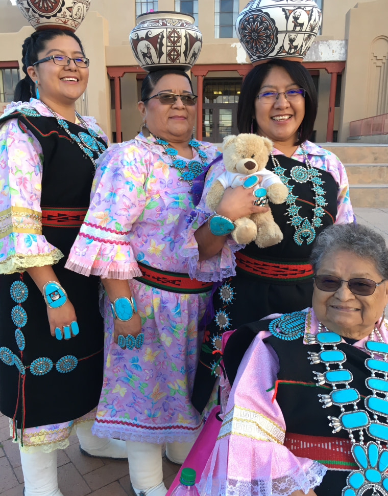 Fuzzy with Zuni Olla dancers in New Mexico.