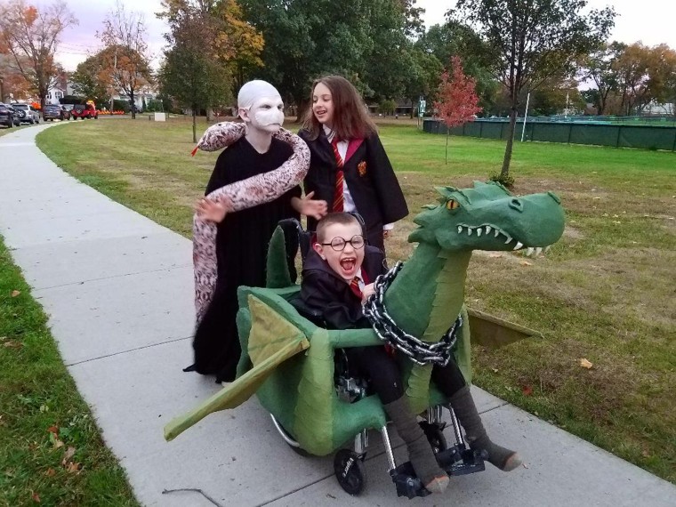 One year, Sam dressed as Harry Potter with a dragon. Sister Imogen and brother James got in on the act. 