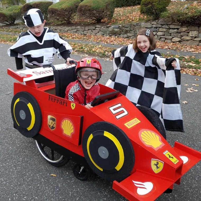Sam's favorite costume was when he dressed up as his idol, Formula One race car driver Sebastian Vettel, with his own car and steering wheel.